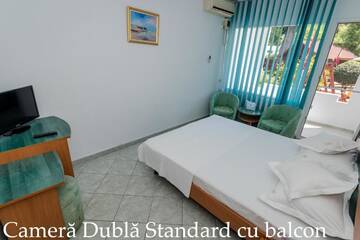 Фото номера Двухместный номер с 1 кроватью и балконом Отель Hotel Tismana г. Юпитер 6