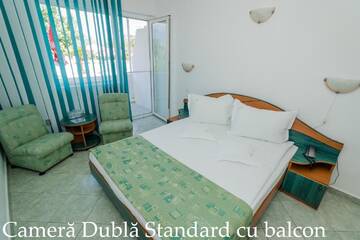 Фото номера Двухместный номер с 1 кроватью и балконом Отель Hotel Tismana г. Юпитер 4